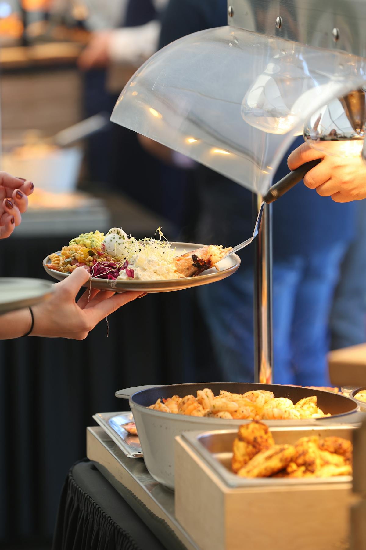 A long table set with a catering spread